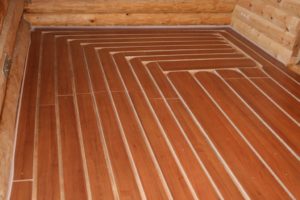 Теплый пол под ламинат на деревянный пол: процесс монтажа и требования
